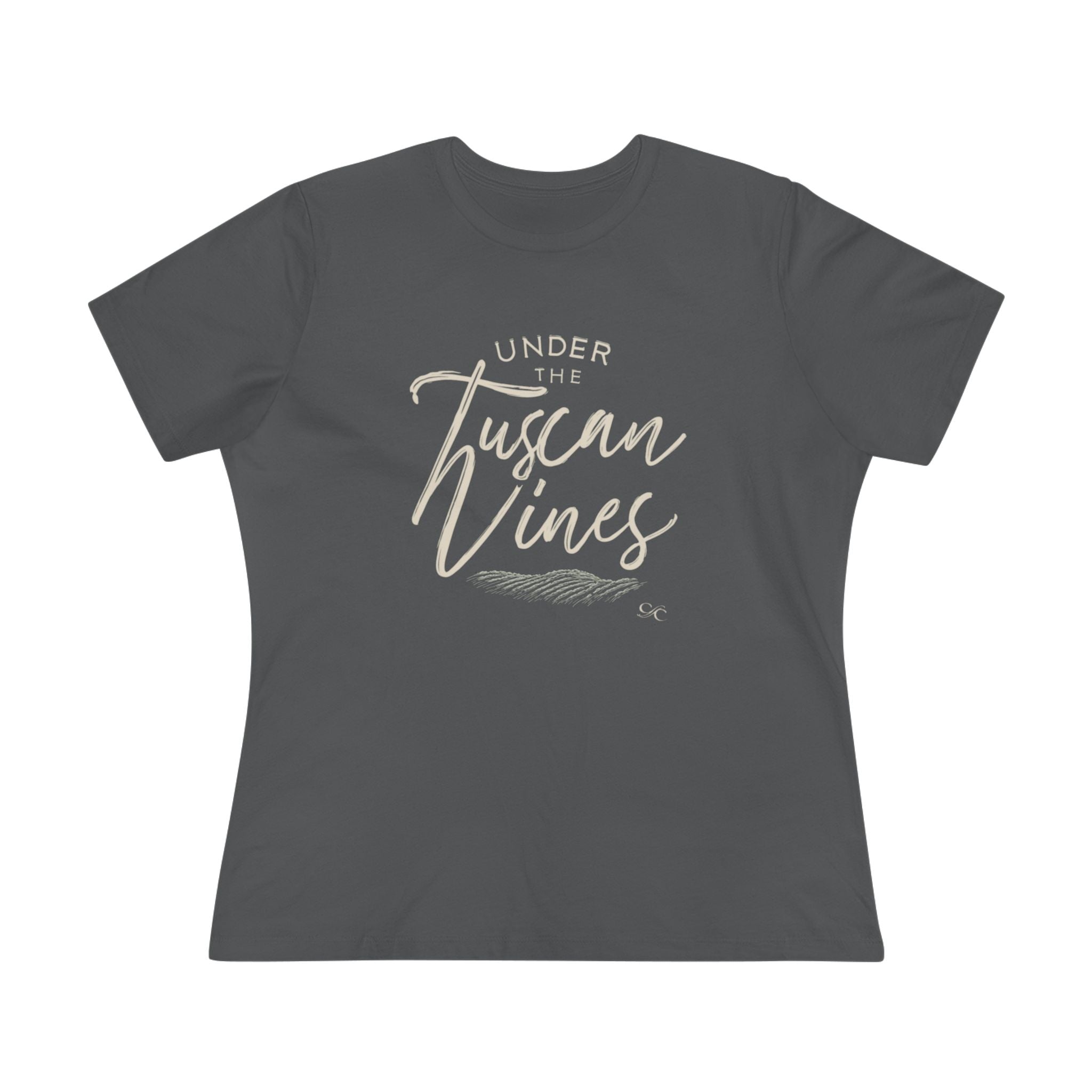 Flat lay of a women’s asphalt cotton tee with the phrase “Under the Tuscan Vines” in elegant script across the chest.